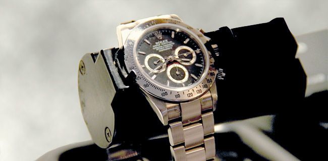 <h1>Rolex ur til reparation</h1><p>Rolex Daytona mekanisk armbåndsur, der er ved at blive reguleret på et af vores moderne regulerings maskiner.</p>